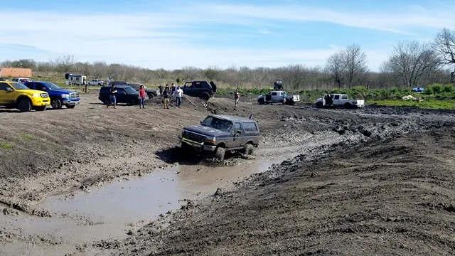 Ford Bronco offroading in the mud at 281 Country Club San Antonio TX