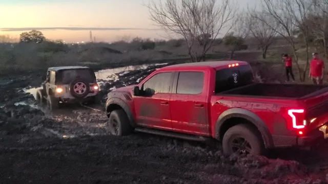 Ford Raptor and Jeep mudding at sunset at 281 Country Club