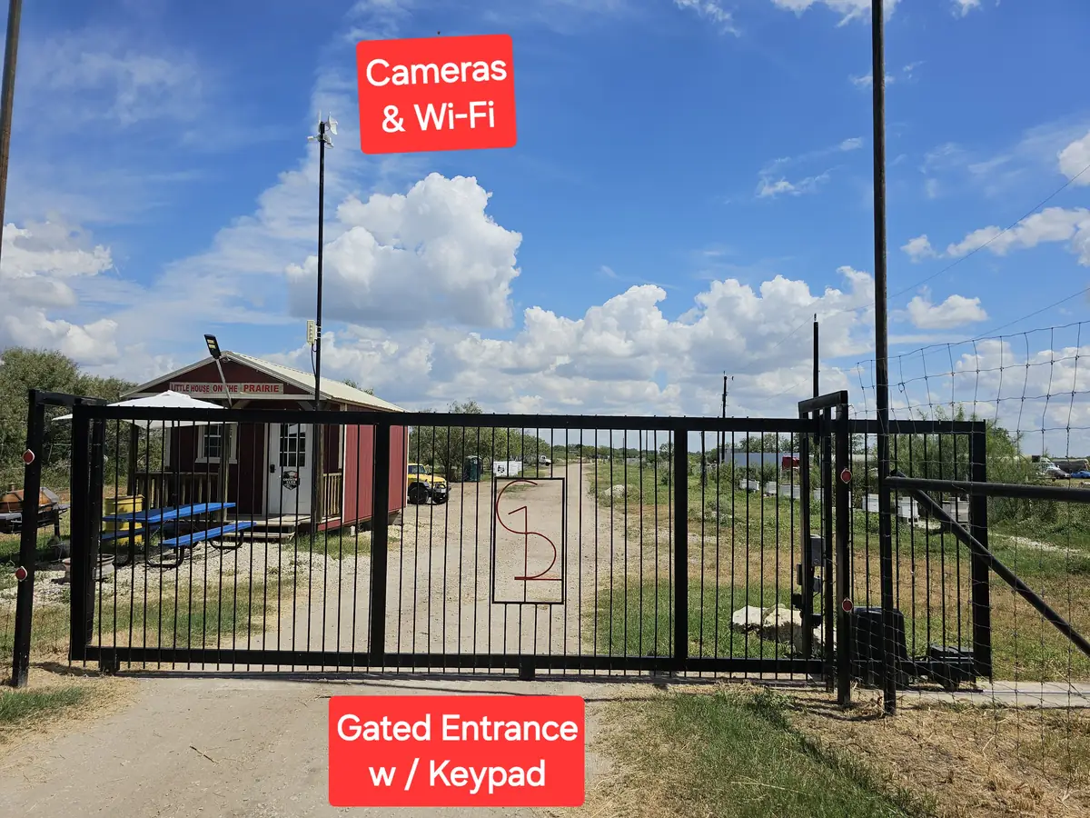 Gated storage lot entrance with keypad code access at 281 Country Club San Antonio TX