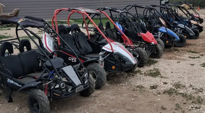 Row of two-seat go karts at 281 Country Club San Antonio TX